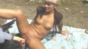 Nude mature in smashing outdoor zoophilia action