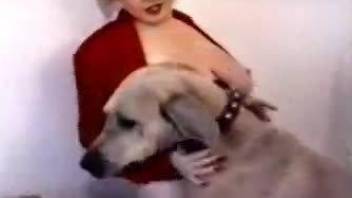 MILF with big breasts attracts smart pet to taste her pussy