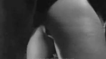 Monochrome hidden cam clip starring a sexy mom and her pooch