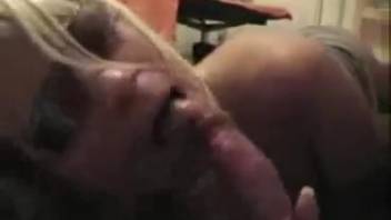 Blond slut blows a canine dick on webcam and enjoys it
