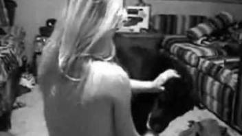 B&W bestiality seduction video with a horny blonde