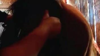 Horny farmer fisting a mare's cunt
