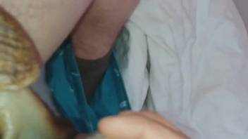 Guy sorta screwing snails that gather around his dick