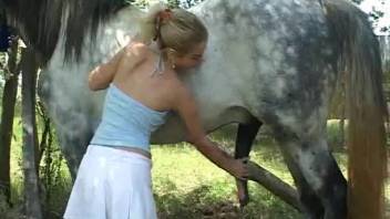 Attractive blonde craves this horse filling her up