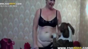 Hard fuck clip featuring a Russian mommy and her dog