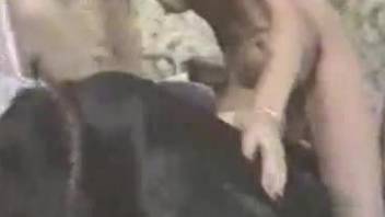 Curly-haired blonde fucking a hung black dog