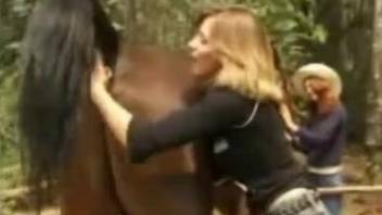 Collared blonde submits to her big-dicked horse