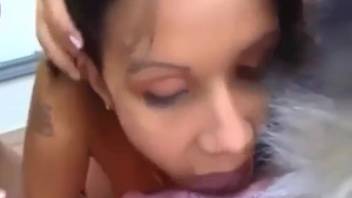 Blonde Latina joins her girlfriend in sucking off a dog's cock