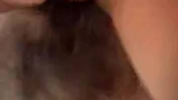 Brunette in black stockings gets screwed by a small dog outside