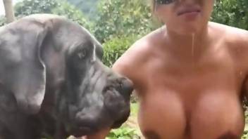 Leather mask Latina deepthroating a dog's red cock