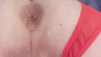 Nude female inserts live worms down the ass and pussy
