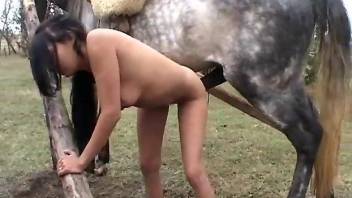 Sexy nude woman lands powerful horse penis into her cunt