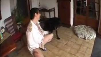 Dark-haired woman being deepthroated by an incredibly hot pup