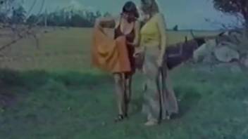 Classic adult film of outdoor bestiality involving two sophisticated ladies